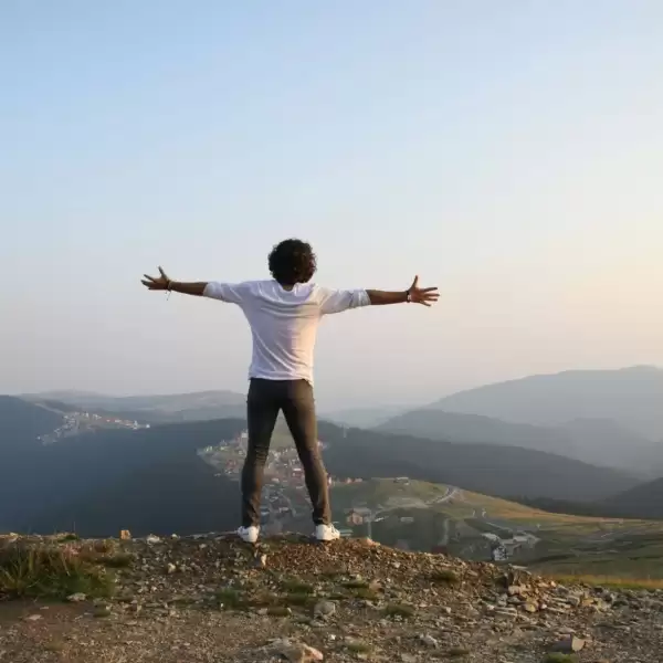 A man expressing carefreeness in nature