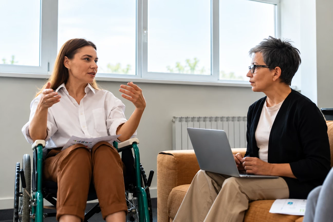 Two people discussing recovery support