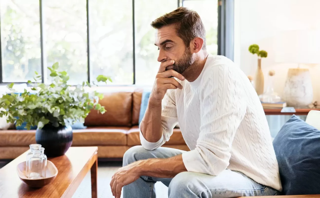 Man reflecting on his mental health and personal wellbeing